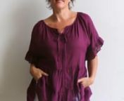 Flowing free size blouse made with beautiful 100% cotton, keeping you cool and covered through our hot Australian summer season.nnThis is a one size garment fitting well on a bust up to 120cm (approximate size 20)