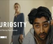 &#39;Curiosity&#39; is a tense, sharply-funny two-hander short film that chimes remarkably well with these strange, claustrophobic, unsettling times. nnAsh and Beth, a new young couple in love, move in together into a dead family friend&#39;s house in the East End of London. Ash, carried away, immediately proposes but Beth wants them to use this time to get to know each other first instead. Then Ash discovers something in the house that fascinates him even more than Beth… an old locked safe. nn‘Curiosit