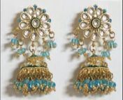 Presenting metal jhumka earrings in golden color with gem stones embellished to make you look stylish and attractive. From the land of rich diversity and culture, these Indian earrings are a world&#39;s favourite!nnhttp://indianbeautifulart.com/traditional-jewelry/earrings/jhumka-earring.html