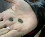 At Zak&#39;s antique shop, he shows off two ancient Roman coins called