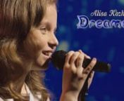 The song &#39;Dreamer&#39; was performed at the Junior Eurovision Song Contest 2014, where Alisa was representing Russia. Music by Maxim Fadeev, lyrics by Alisa Kozhikina, Olga Seryabkina.nnThe &#39;Dreamer&#39; song lyrics:nnHow can I tell you that I lovenWith the wind hand in hand I am catch the rays of sunlight for usnAnd if you want, you can sleep and I will sing for younAnd so close above the star, and I will give you my dreamnnLike white angels in the sky we were flying,nAnd we just wanted to touch the sk