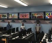 In January of 2016, Settlement Housing Fund sponsored 15 students from its DREAMS YouthBuild program and the S.O.S. – Crown Heights Mediation Center to work with Groundswell on a mural for the new SUNY Attain Computer Lab at St. John’s Place in Crown Heights.nnIn partnership with the Brooklyn DA’s office, the intent of the project was to improve relations between young adults local law enforcement.nnMid-way through the project, the students decided that their original mural design was not