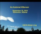 Wave crests floating downstream - that&#39;s what these lenticular clouds are doing. On the afternoon of September 25th, 2016, the skies of Edmonton contained a number of these lens-shaped clouds, notably different from the cauliflower puffs of summer. The atmospheric flow some 8km up was from an upper warm front back to the WSW, the current speeding across the Rockies of western Canada and bouncing in waves. The clouds form at the crests , sometimes remaining in place as the bounces become steady,