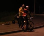 I&#39;m working toward a treatment of the footage I have of the night section of this event. We were marshalling at one of the roundabouts on the night circuit. The stationary rider in this section is Marina Bloom. Fourth fastest lady ever over 24 hours with 447 miles in 2007. She is seen here deciding not to continue at 237.15 miles after 12 hours, she was riding 89 inch fixed at age 41, a true &#39;fixie chick&#39; heroine, any coincidence in the lyrics and the action is not meant to relate to the action