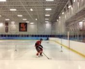 This video provides an example of a player pushing the puck during the 50 or 75 FT Forwards Skate With a Puck.nnThe first gate will be setup 5 Feet off the Goal Line and the distance between the two gates (lasers) will be 50 Feet apart for U7 and 75 Feet apart for U9-U18.nnPlayers will start from a stand still on the goal line. Players can use either a V Start or Cross Over Start to start.nnWhen the coach says go, the player will skate between the gate, and the first laser will begin to time whe