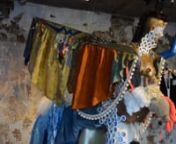 Interstellar Uber/Negotiations with God, Saba Taj (Durham, NC)nSouthern Constellations Fellowship. July 2017. Mannequins, roller skates, fabric, baubles, pre-made fabric clouds, wigs, bottle caps, ghosts.nnInterstellar Uber // Negotiations with God is a kinetic Buraq sculpture that resides in Elsewhere’s Ghost Room. The Buraq (meaning sparkle, or lightning) is the steed that Prophet Muhammad rode during his “Night Journey” from Mecca to Jerusalem around 610 AD, and then to the seven levels