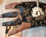 Drawing around henna stencils for henna design on the hand. Easy, quick henna/mehndi designs using henna stencils. With a wide range of designs for the body, feet, arms, legs, chest, we help you take the time out of thinking of designs to suit any occasion.