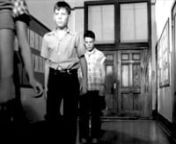 Obey / Follow (Silent Version) Slow minimalist cinema. Post-structuralist political statement and détournement of a vintage instructional film.nnSchool children emerge slowly from a classroom during an air raid preparedness drill - circa early 1950s - demonstrating a culture, not unlike the present, that fosters fear, alarm, sadness, and a frightening level of conformity; a society marching towards apocalypse, with frightened children pushed to the brink.nnThere is a strong level of awareness