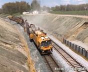 April 27, 2018 - A LoRam Ballast Cleaner works between Nortonville and Romney on track 1 as it heads south on the Henderson Subdivision.nnAccording to Wikipedia: A ballast cleaner (also known as an undercutter) is a machine that specializes in cleaning the railway track ballast (gravel, blue stone or other aggregate) of impurities.nnOver time, ballast becomes worn, and loses its angularity, becoming rounded. This hinders the tessellation of pieces of ballast with one another, and thus reduces it