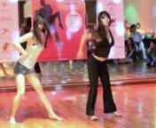 A short clip of 2 very talented ladies dance a hip hop routine created by themselves at Passion for Life, Dance for Charity Event in Singapore. The song is &#39;Huh&#39; by 4minute, a Korean pop group. Well done!!nnI&#39;m not sure why the image quality is so blurry. Maybe out of focus at times.