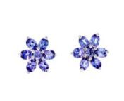 https://www.ross-simons.com/934524.htmlnnThese pretty purple gemstone flowers will illuminate your face! 2.10 ct. t.w. oval and round tanzanites create beauteous blooms in polished sterling silver. Post/clutch, tanzanite flower earrings.