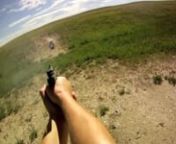 Shooting a Buck Mark .22 Caliber Pistol, Winchester .30-06 SPRG Caliber Rifle and Remington 1100 12-Gauge Shotgun at Pawnee National Grassland on Aug. 6, 2011.