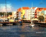 Located off the coast of Venezuela and just outside the South Caribbean hurricane belt, the island of Curacao shares its name with an alcoholic drink made from bitter oranges exclusive to the island. First conquered by the Spaniards in 1499 and taken over by the Dutch in 1634, Curacao soon after became a trade island, its indigenous peoples captured and enslaved, as well as an important smuggling, privateering, and slave trade base. Curacao has been a constituent nation in the Kingdom of the Net