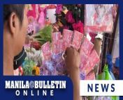 A florist at Mama Babes flowershop in Dangwa Market, Manila arranges a money boquet on Tuesday, Feb. 13, a day before Valentine&#39;s Day. Money emerges as the top choice for Valentine&#39;s Day gifts among Filipinos, according to a result from a recent Social Weather Stations (SWS) survey. (MB Video by Noel B. Pabate)&#60;br/&#62;