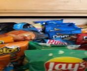 This person discovered their snack drawer open and attempted to close it, but failed. When they looked closely, they noticed their cat peeking out from behind the drawer, which puzzled them as to how she got there.