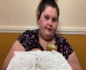 Amberlynn tries different options from Subway reviewing and sharing her thoughts on each item. Becky is also at the table as the mukbangs would not have been possible without her driving skills.