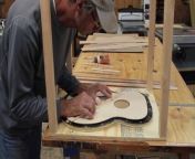 A Luthier provides a basic overview of the steps to construct a hand-crafted acoustic guitar.