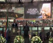 The bogus sign language interpreter at last week&#39;s Nelson Mandela memorial service was among a group of people who accosted two men found with a stolen television and burned them to death.