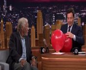 Jimmy Fallon talks to Morgan about his Science show, Through the Wormhole with Morgan Freeman, while they suck the helium out of balloons.