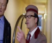 Without his enchanted amulet, Conan reverts to his ancient, withered state. Not that bellboy Andy Daly notices.