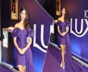 Suhana Khan stuns in Lux&#39;s 100-Year Celebration, embodying elegance and beauty in an off-shoulder purple mini dress.