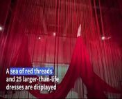 Red ropes and larger-than-life dresses float in the tunnel of a former Nazi death camp in Ebensee, Austria, as the exhibition by Japanese artist Chiharu Shiota &#92;